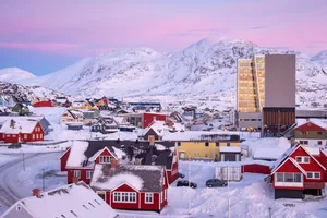 The Nuuk Center stands out among the wooden houses of the old town